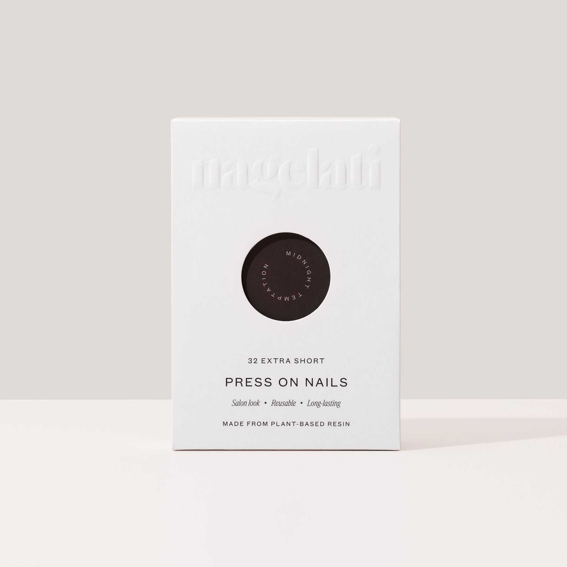 Press-on nails in plastic-free packaging made from FSC-certified paperboard.